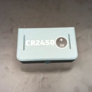 PUDEŁKO NA BATERIE CR2450 PASTYLKI.