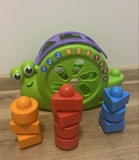 Fisher Price, sorter kształtów Śpiewający Ślimak PL