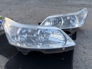 Para reflektorów do samochodu Citroën C4 I generacji (2004–2010).