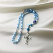 Różaniec akrylowy jasnoniebieski – perłowy połysk, srebrny krzyż