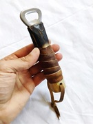 Otwieracz ręcznie robiony drewniany.