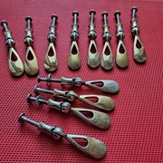 Stare uchwyty meblowe do mebli PRL 14 szt Złote