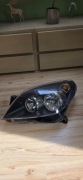 Lewa Lampa Opel Astra H przed liftem.  1EG 270 370-01