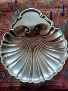 Tacka stojąca w kształcie muszli stara