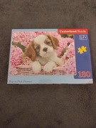 Puzzle 180 el. Pup in Pink Flowers.