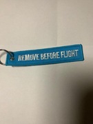 Haft "remove before flight" w kolorze niebieskim