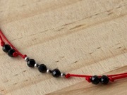 bransoletka ochronna z Turmalinem na czerwonym sznurku 