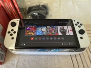 Nintendo Switch OLED Biały White + etui + 4 gry