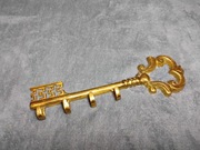 Dekoracyjny mosiężny wieszak na klucze w kształcie klucza