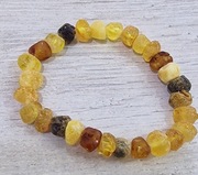 Bransoletka z naturalnego bursztynu nie polerowanego ok 10mm !!