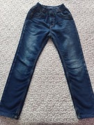 Zimowe spodnie jeansy ocieplane polarem r.16