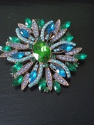 Piękna metalowa broszka złoto i kamienie