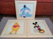 Trzy obrazki w ramkach postacie z bajek 