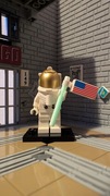 Minifigurka LEGO TWN373 NASA Apollo 11 Astronauta + flaga / świeci w nocy
