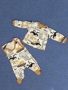 Komplet niemowlęcy kaftanik i śpiochy rozmiar 56