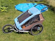 Przyczepka amortyzowana Croozer Kids Plus 2 rowerowa biegowa spacerówka