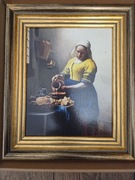 Reprodukcja obrazu Vermeera "Mleczarka" w eleganciej ramie Rijksmuseum