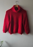 Czerwony golf włochacz z błyskiem