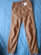 Nowe spodnie H&M r.134