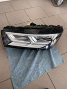 Reflektor przedni lewy Audi Q5 80a941033c