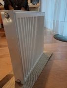 Grzejnik panelowy PURMO 60x50x10 / dolny / obrotowy / wieszaki