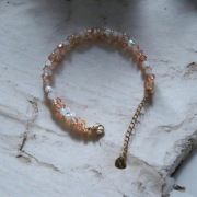 Bransoletka handmade brzoskwiniowo-złota/regulowana/delikatna i elegancka