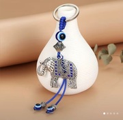 Modny brelok Oko Proroka z motywem Słonia na klucze.