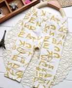 Bawełniane legginsy z literami złote 9 miesięcy