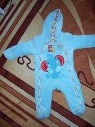 Mięciutki, śliczny kombinezon Fisher Price, r.74