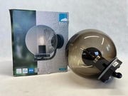 Kinkiet ogrodowy czarny z kulą dymioną IP44 Taverna 99586 EGLO