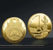 Moneta z złotą wieżą Eiffla 