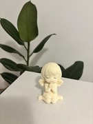 Figurka Anioła na tort z polewy czekoladowej