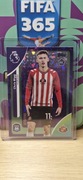 Topps Premier League 2026 Chris Rigg Fioletowy Diament #070/199