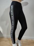 Czarne sportowe legginsy firmy Muscle Nation używane rozmiar S/36