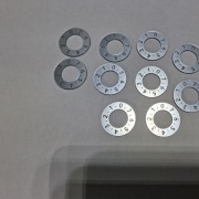 Szyld naprężacza nici do maszyny Łucznik