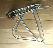 Oryginalny bagażnik do roweru Gazelle + lampa tył