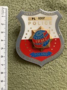 Odznaka policyjna z numerem Policja IPMC Poland