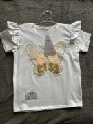 Bluzeczka z cekinowym motylem r. 122