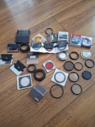 Zestaw filtrów i przejsciówek fotograficznych 