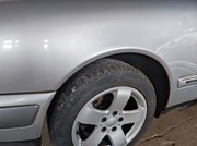 Błotnik Mercedes W210 przód przedni 744