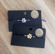 Bransoletka regulowana na sznurku psia łapka 