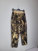 Spodnie czarno złote 