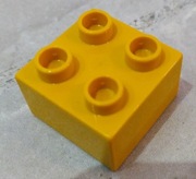 LEGO Duplo klocek 2x2 musztardowy 