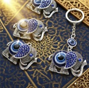 Elegancki breloczek z okiem Fatimy z pięknym Słoniem 