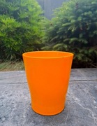 Ceramiczna pomarańczowa osłonka na kwiatka dla storczyka