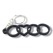 Stylowy brelok z motywem 3 pierścieni i serca