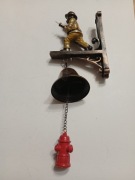 Dekoracyjny dzwonek w kształcie strażaka straż pożarna  do powieszenia.