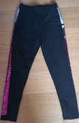 Spodnie LC Waikiki cekinowe lampasy 8-9 lat