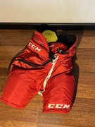 CCM Spodnie Hokejowe AS1 Senior S Czerwone 