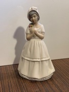 Ładna figurka dziewczyna z kwiatami 